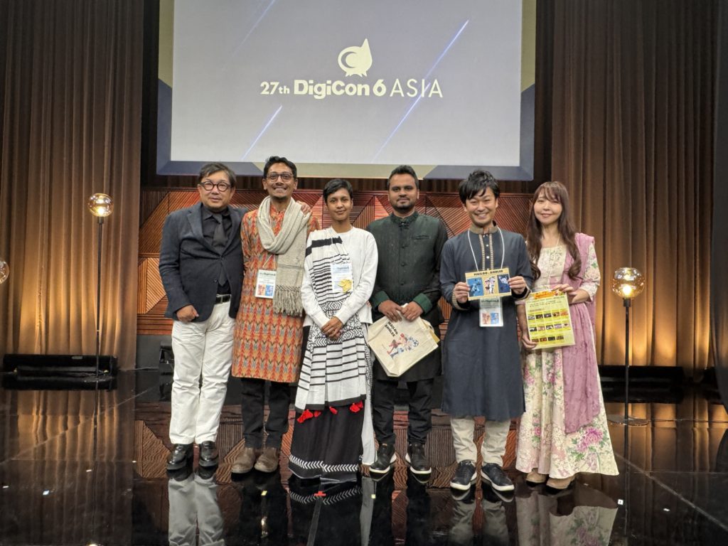 Commemorative photo at the DigiCon6 ASIA awards ceremony with TBS organizers, Bangladeshi winner Director Afroza Hossain, and Studio PADMA as the official organizer.